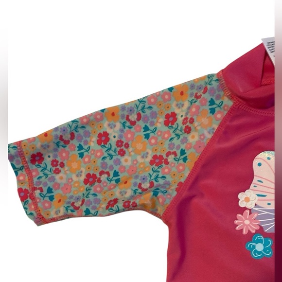 Vibrant Pink Rashguard with Floral Sleeves and High Collar - Picture 5 of 5